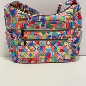 🦚 Lug Camper SE Crossbody Bag. NWT. “Disney Small World” pattern